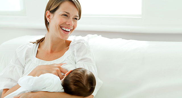 mother nursing an infant